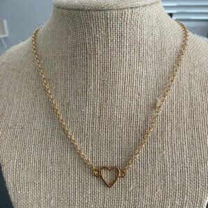 Hand-made gold chain with golden heart